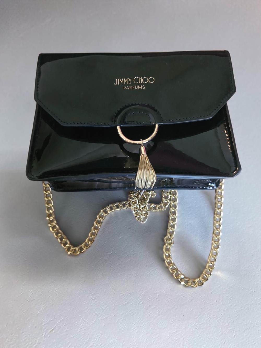 Jimmy Choo Black Patent Crossbody with Gold Ring and Tassel
